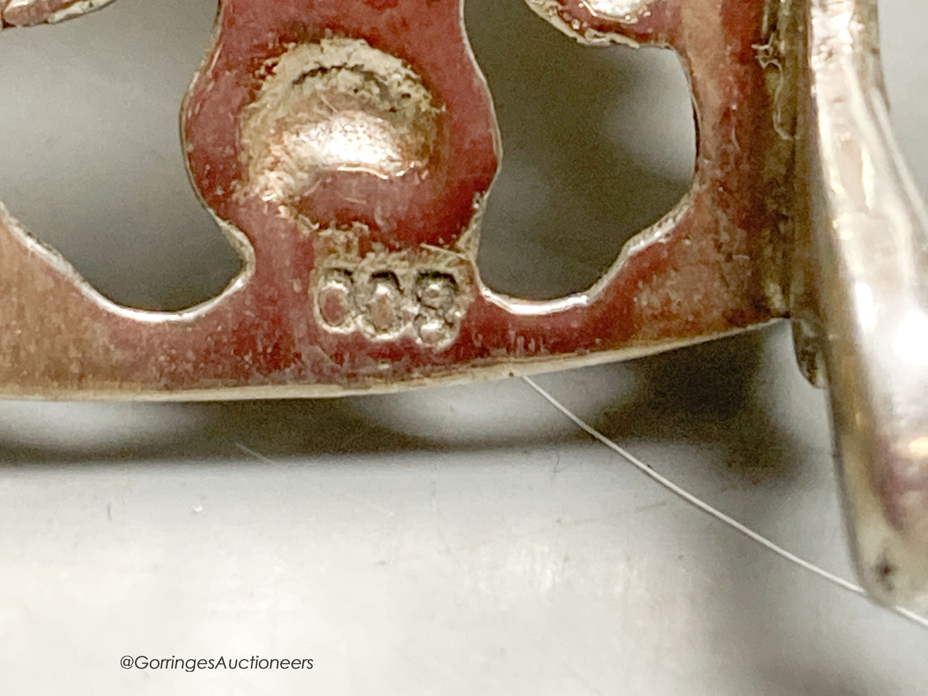 Two early 20th century German 800 standard pierced white metal letter racks, decorated with sailing ships, longest 13.8cm